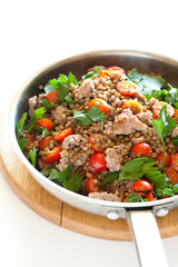 Fresh cooked meal with sausages, tomatoes and lentils