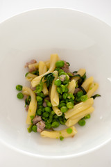 food plate of pasta, ricotta, pesto and basil
