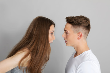 Teenage couple in argument.