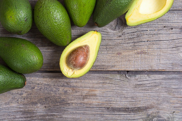 Fresh avocado on wooden background