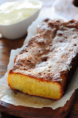 fresh baked lemon cake on wooden table
