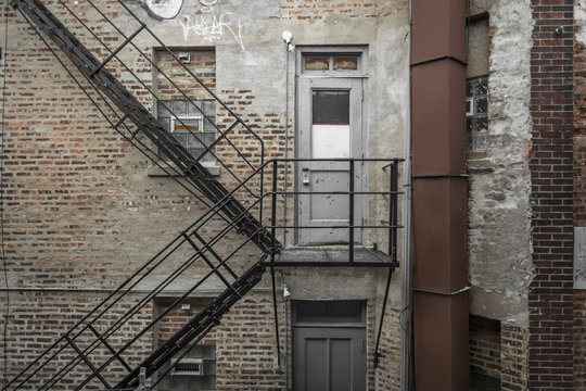 Back of a brick building - Powered by Adobe