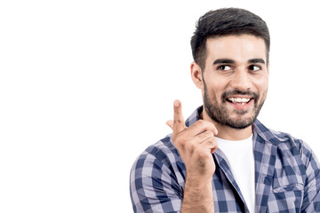 Portrait of young thinking man isolated on white background