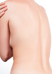 Woman from the back, naked body, pain concept