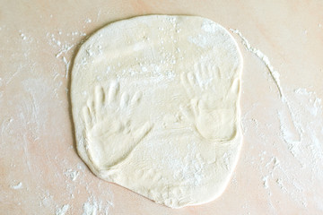 Dough with handprints