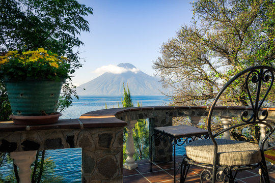 Very special view of Volcano San Pedro from a charming terrace on the shore of Lake Atitlan in Guatemala.