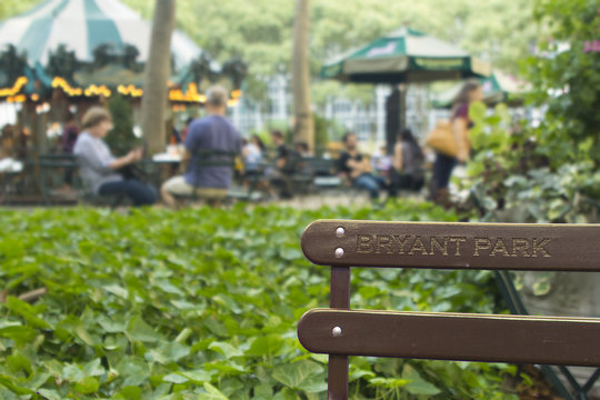Bryant park background wallpaper high res bench with people leusure concept relaxing in the city natural resources and casual atmosphere upscale new york.