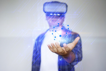 Young man wearing virtual reality glasses ,Virtual reality concept
