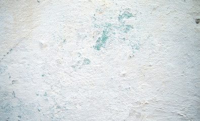 Old cracked wall of white color