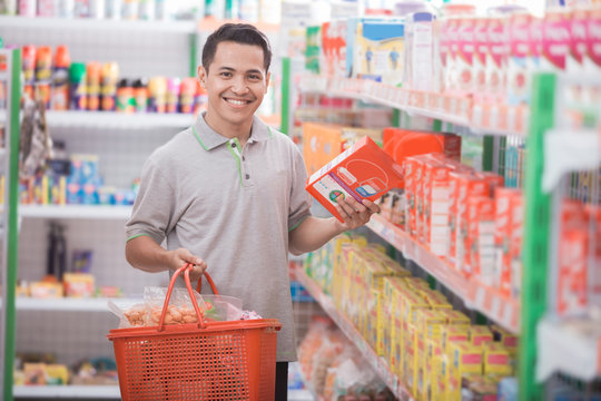 Asian Man In Grocery Store