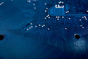 Blue circuit board background of computer motherboard-defocused concept