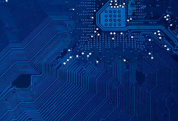 Blue circuit board background of computer motherboard-defocused concept