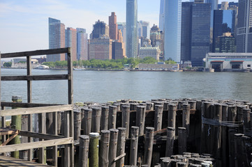 Wooden pilons at the ferry dock on Governors Island national park in Manhattan in New York City,...