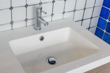 Bathroom interior with sink and faucet