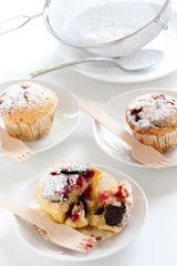 Homemade muffins with raspberries and dark chocolate
