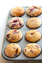 Homemade muffins with raspberries and dark chocolate