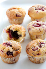 Homemade muffins with raspberries and dark chocolate