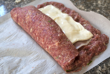 rolling filled meatloaf with cheese and frittata