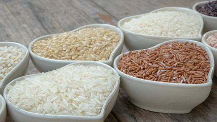 Different rice in ceramic bowl on the table