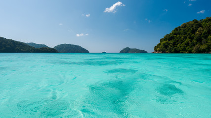 Blue and bright sea water surface at the open sea, Beautiful blue sea at Surin island, Thailand