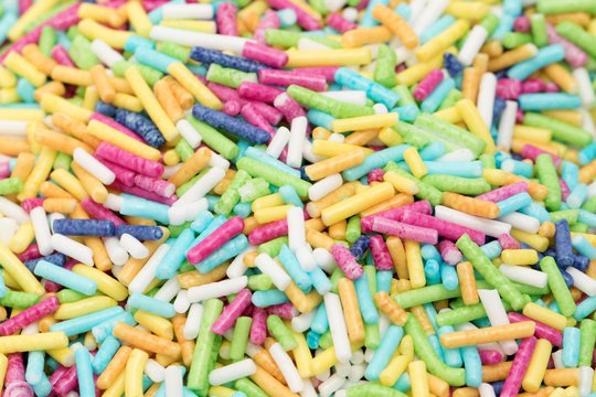 colorful sugar sprinkles on white