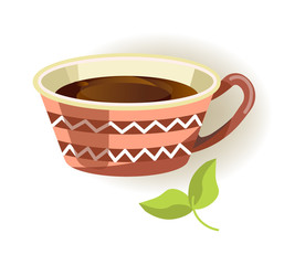 Ceramic cup with pattern and black tea inside