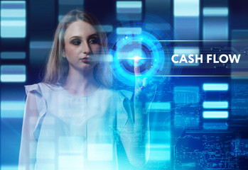 The concept of business, technology, the Internet and the network. A young entrepreneur working on a virtual screen of the future and sees the inscription: Cash flow