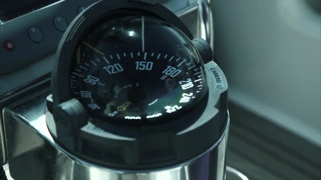 Close up of nautical compass on yacht
