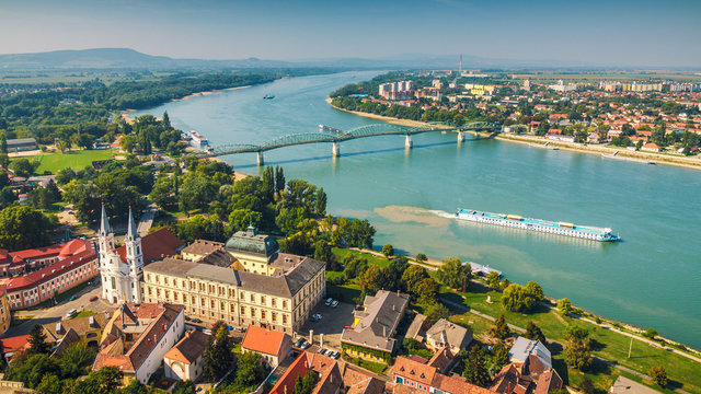 View of the Hungarian historic town from the basilica in Esztergom, the Danube river and the border bridge to the town of Sturovo in Slovakia.