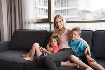 Fototapeta premium young mother spending time with kids