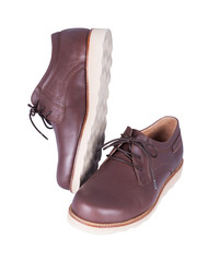 Brown leather men's shoes isolated on white background