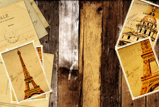 Retro grunge cards with landmarks of Paris on wooden planks