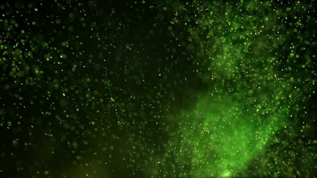 Glowing green particles in turbulent air. Computer generated seamless loop abstract motion background 4k (4096x2304)
