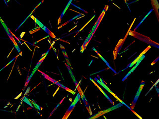 Crystal layer seen in polarized light in a microscope.