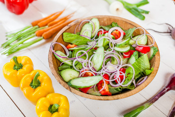 vegetable salad bowl on kitchen table, balanced diet