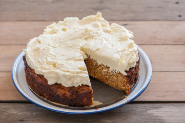 Homemade cake with carrot, cheese and cream