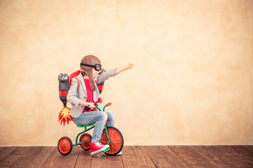 Kid with jet pack playing at home
