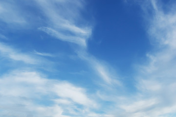 Soft white clouds against blue sky background and empty space for your design