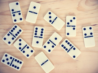 Dominoes on wooden table