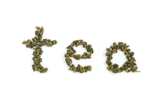 Fresh Tieguanyin Oolong tea leaves arranged in English letters as "tea" word on white background for hot or cold drinks