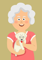 Cute elderly senior woman holding labrador puppy