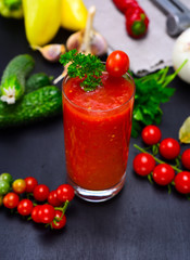 Freshly made juice from red tomato and vegetables