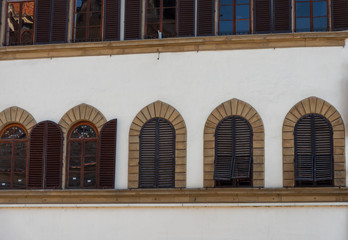 Details of the exterior of Italian buildings in Florence, Tuscany, Italy.