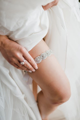 Bride takes on crystal garter