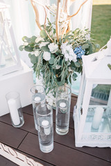Vases with candles on the water