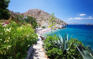 View from Hydra Island. Castello Hydra and Kamini beach. Blue sky