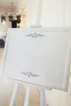 Easel with white frame
