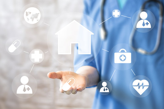 Doctor pushing button house home virtual healthcare network on virtual panel