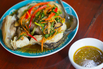 hot spicy steam fish bass food with sauce