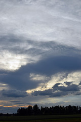 Fototapeta premium Dramatic sky after storm. Vertical image
